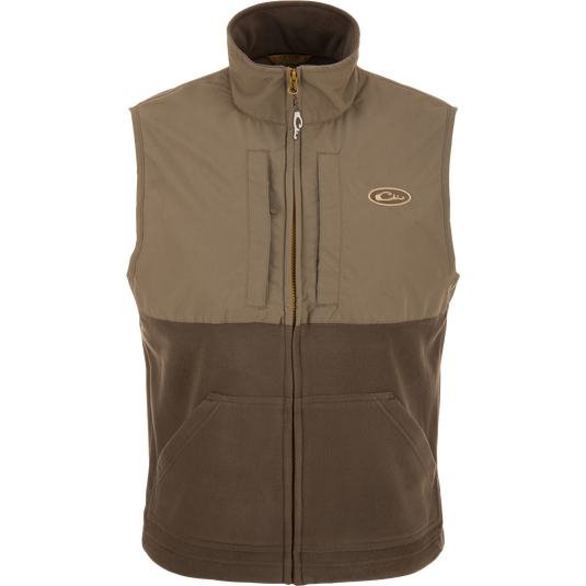 Close-up of the MST Eqwader Vest, highlighting the waterproof upper body with zippered chest pockets and fleece lower torso for breathability, ideal for hunting.