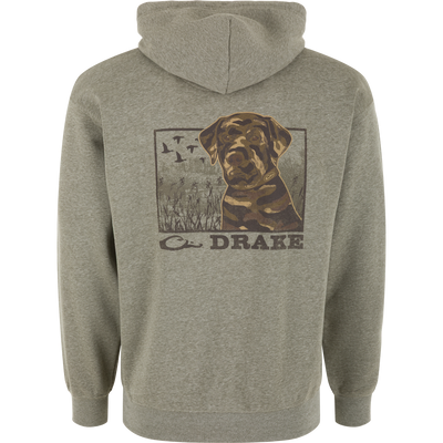The Black Lab Print Hoodie by Lifestyle in Kalamata Light Heather features a Black Lab print with tall grass, flying ducks, and “DRAKE” on the back—perfect for outdoor enthusiasts.