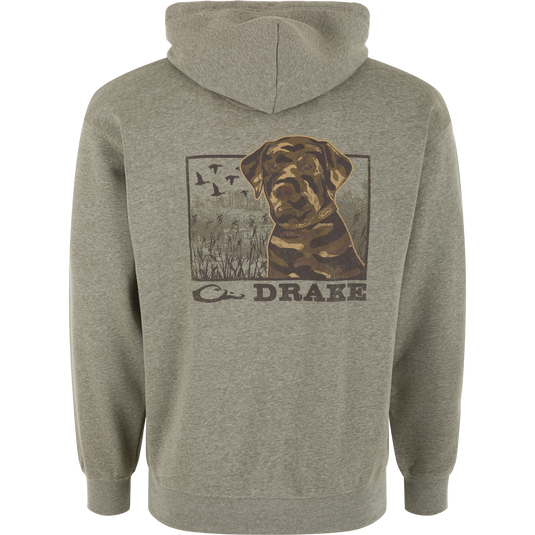 The Black Lab Print Hoodie by Lifestyle in Kalamata Light Heather features a Black Lab print with tall grass, flying ducks, and “DRAKE” on the back—perfect for outdoor enthusiasts.