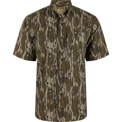 Short-Sleeved Flyweight Camo Hunting Shirt on mannequin, showcasing lightweight fabric, vented cape back, and dual chest pockets with hidden zippers, suitable for outdoor activities.