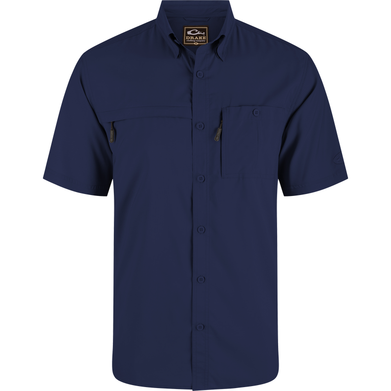 Americana 8-Shot Flyweight Shirt with dual chest pockets; one buttoned, one zippered. Features hidden button-down collar and vented cape back for breathability.
