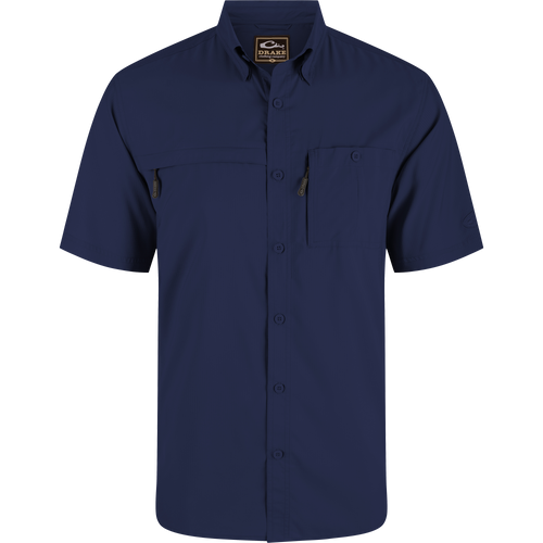 Americana 8-Shot Flyweight Shirt with dual chest pockets; one buttoned, one zippered. Features hidden button-down collar and vented cape back for breathability.