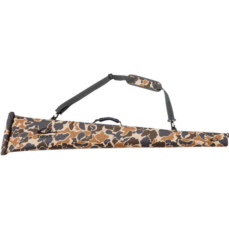 Hardline Waterproof Gun Case in camouflage with molded grip and shoulder strap, designed to keep shotguns dry with waterproof construction and floatability features.