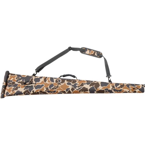 Hardline Waterproof Gun Case in camouflage with molded grip and shoulder strap, designed to keep shotguns dry with waterproof construction and floatability features.