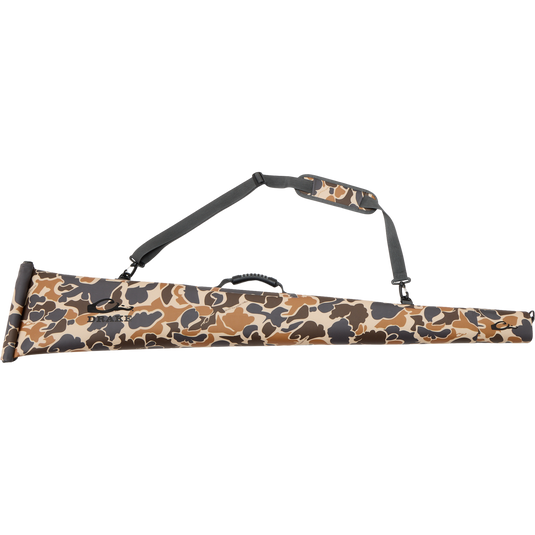 Hardline Waterproof Gun Case in camouflage with molded grip and shoulder strap, designed to keep shotguns dry with waterproof construction and floatability features.