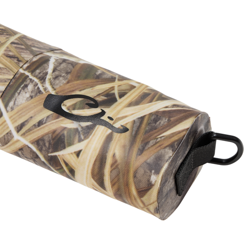 Hardline Waterproof Gun Case with marsh-grass camouflage, features a D-ring clip and neoprene sleeve, designed to keep shotguns dry and floatable.