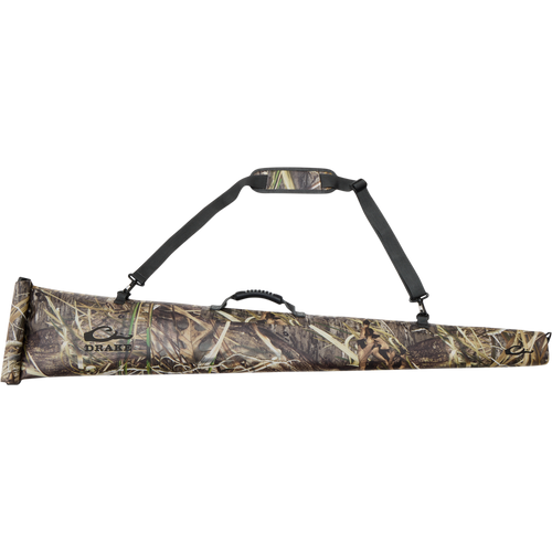 Hardline Waterproof Gun Case in camouflage, with molded handle and shoulder strap, featuring waterproof construction and roll-top closure, fits shotguns up to 28 with extended choke tubes.