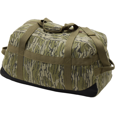 Throwback 80 Duffle Bag close-up, showcasing durable cotton canvas, suede bottom, and rugged bronze buckles, perfect for adventurous hunting and outdoor pursuits.