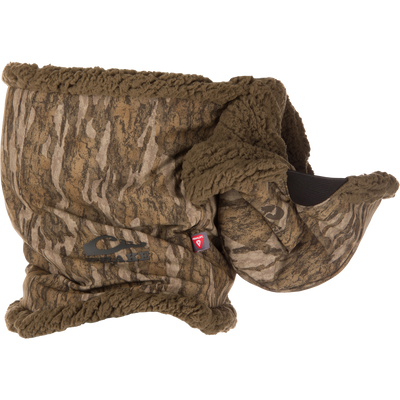The LST BMF Balaclava with Primaloft by Waterfowl features brown camouflage-patterned sherpa fleece, a plush lining, and a logo patch—perfect for warmth and essential for cold-weather outdoor use.