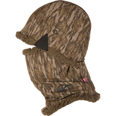 The Waterfowl LST BMF Balaclava with Primaloft features camo fabric, a split mouth opening, sherpa fleece lining, and elastic edges—ideal for outdoor activities in cold weather.