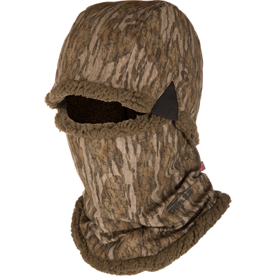 The Waterfowl LST BMF Balaclava with Primaloft in Mossy Oak Bottomland covers head and neck, leaving only the eyes and nose exposed—ideal for cold-weather concealment.