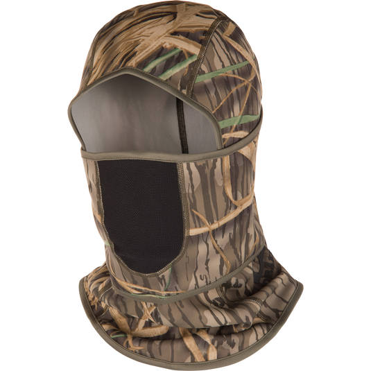 The Waterfowl MST Fleece Convertible Face Mask in Mossy Oak Original Shadow Grass features stretch fleece, an open face area, and mesh mouth covering—perfect for outdoor activities like hunting. Displayed on a white background.