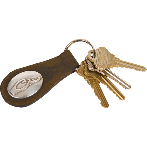 Leather Key Chain featuring a Drake logo on a brushed silver emblem, with a sturdy leather strap and heavy-gauge ring for secure key storage.