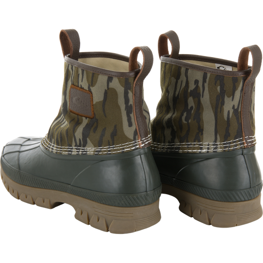 RTL - Throwback 80 Waxed Canvas Slip On Duck Boot featuring waterproof rubber lower, camouflage canvas upper, leather lining, and deep-tread soles for rugged outdoor performance.