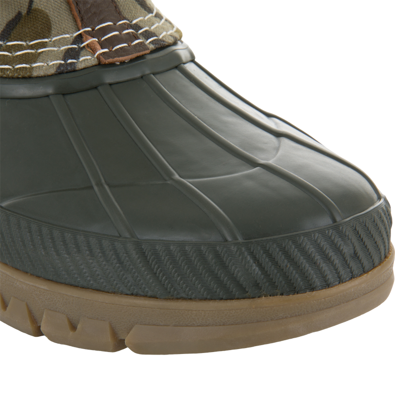 RTL - Throwback 80 Waxed Canvas Slip On Duck Boot showing waterproof molded rubber shell, textured welt, and rugged lugged outsole for reliable traction in wet conditions.