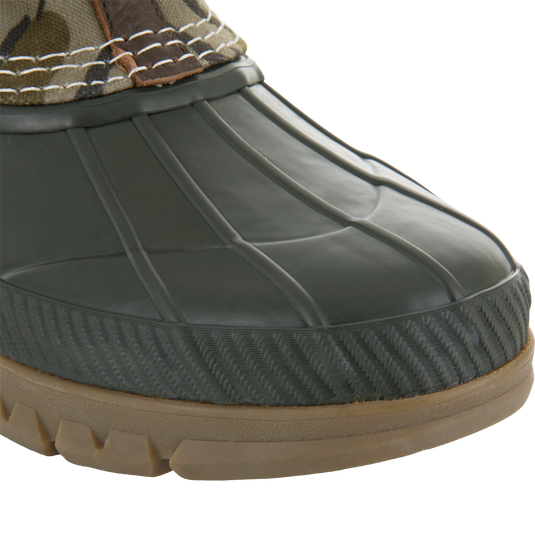 RTL - Throwback 80 Waxed Canvas Slip On Duck Boot showing waterproof molded rubber shell, textured welt, and rugged lugged outsole for reliable traction in wet conditions.