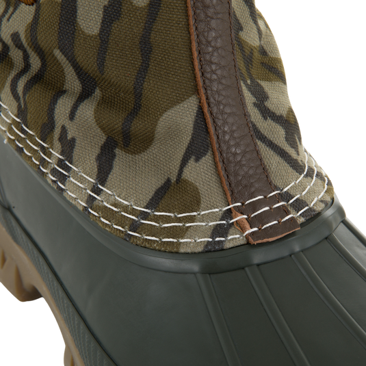 RTL - Throwback 80 Waxed Canvas Slip On Duck Boot featuring camo upper, olive rubber lower, leather seam, and durable waterproof design with removable insole for comfort.