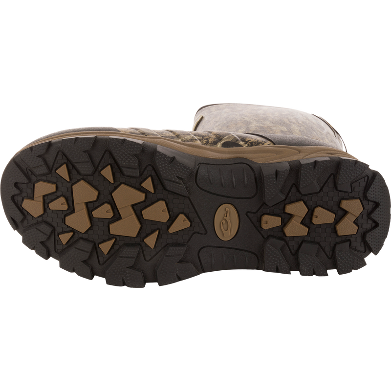 Underside view of EST Uninsulated 16 Hybrid Mudder Boot 3.0, showcasing heavy-tread rubber outsole with angular lugs for traction on rough terrain.