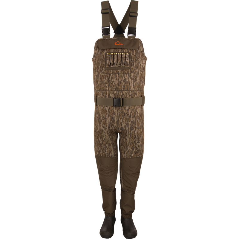 Youth Neoprene Wader with camouflage pattern, adjustable suspenders, reinforced knees, front pocket with elastic loops for shells, and integrated 400g Thinsulate Buckshot Mud Boots.