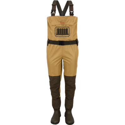 The Waterfowl Hardline Uninsulated Breathable Wader in Field Khaki features black adjustable suspenders, a front pocket, and built-in Thinsulate rubber boots, shown against a plain white background.