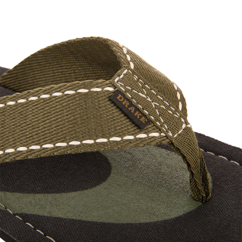 Lake Shore Flip Flops feature an olive-green woven strap with DRAKE tag, camouflage-style footbed, ideal for comfort and durability in outdoor adventures.