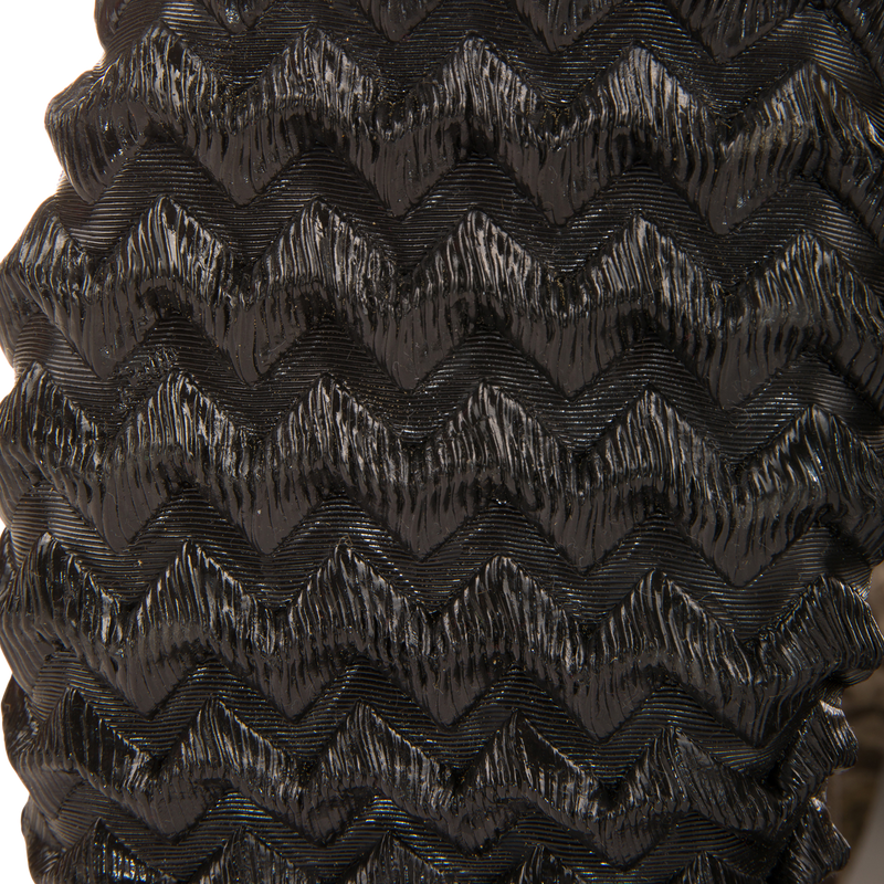 Close-up of the embossed chevron pattern on the Hardline Insulated Breathable Wader, showcasing its durable, waterproof material designed for outdoor adventures.