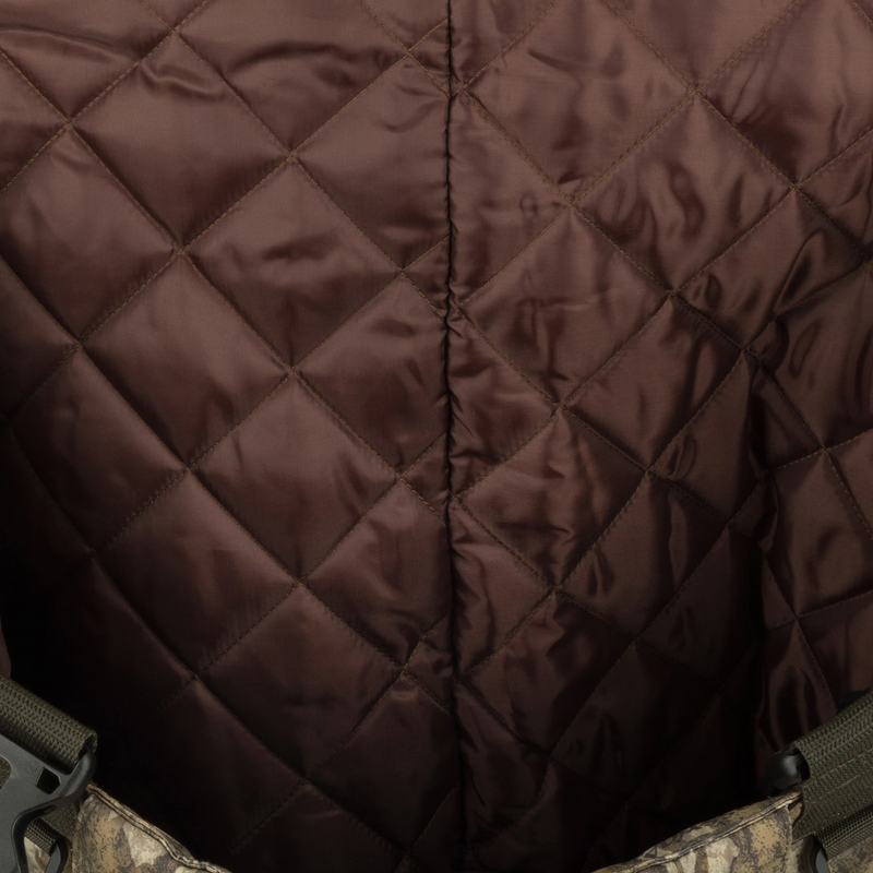 Hardline Insulated Breathable Wader's interior shows quilted satin-like lining, camouflage panel, and adjustable green strap, highlighting comfort and functionality for outdoor adventures.