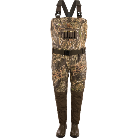Hardline Insulated Breathable Wader with camouflage pattern, adjustable straps, ammo holder, and built-in rubber boots for waterfowl hunting and angling in cold conditions.