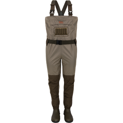 The Waterfowl Hardline Insulated Breathable Wader in Mud Brown features adjustable suspenders, a front pocket, belt, reinforced knees, and Thinsulate rubber boots for comfort and warmth. Shown against a white background.