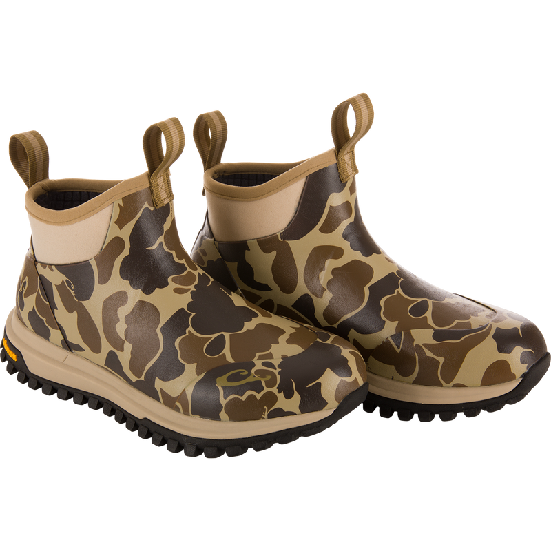 Offroad Rubber Deck Boots with camouflage print, featuring waterproof construction, rugged treaded sole, and pull tabs for easy wear, designed for demanding waterfowl conditions.