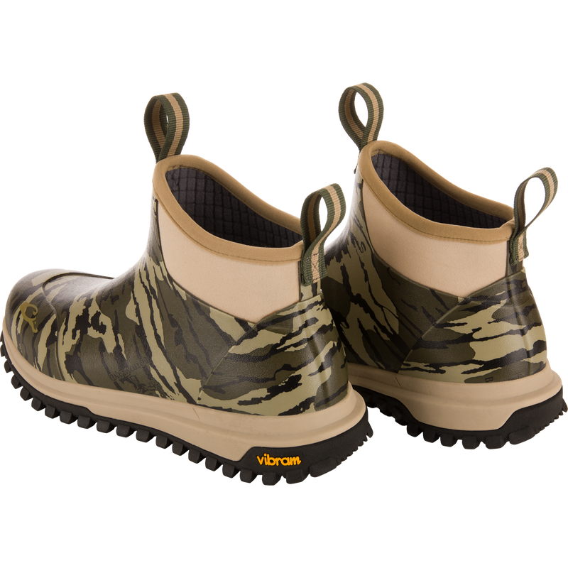 Offroad Rubber Deck Boots feature camouflage design, neoprene collars, dual pull-tabs, and rugged Vibram® soles, ideal for waterfowl hunting with waterproof, flexible construction.