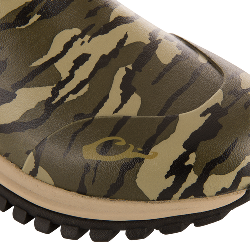 Close-up of the Offroad Rubber Deck Boots, showcasing the camouflage-patterned waterproof rubber upper and sturdy lugged sole, designed for demanding waterfowl conditions.