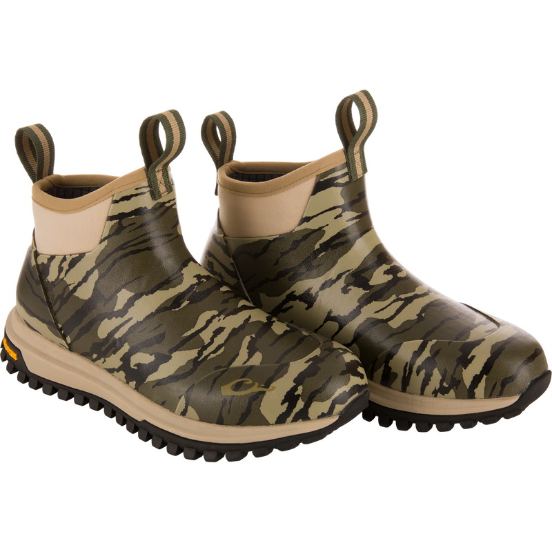 Offroad Rubber Deck Boots with camouflage pattern, featuring neoprene uppers, pull-tabs, and lugged rubber soles designed for waterproof, flexible movement in demanding waterfowl conditions.