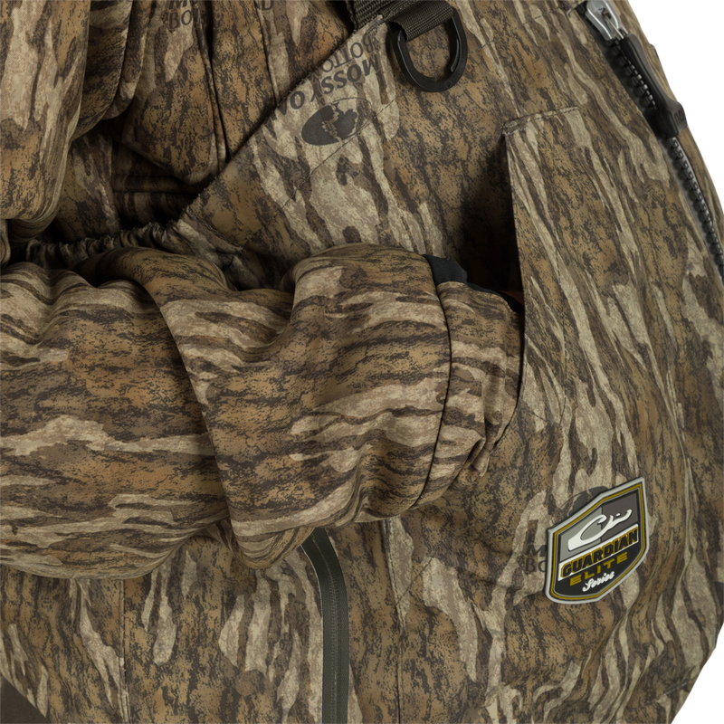 Uninsulated Guardian Elite HND Front Zip Waders: close-up of hand in pocket.