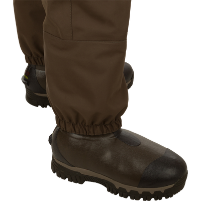 Insulated Guardian Elite HND Front Zip Wader with durable, waterproof Guardian Elite fabrics and reinforced seams, featuring a close-up of the brown Thinsulate-lined boot.