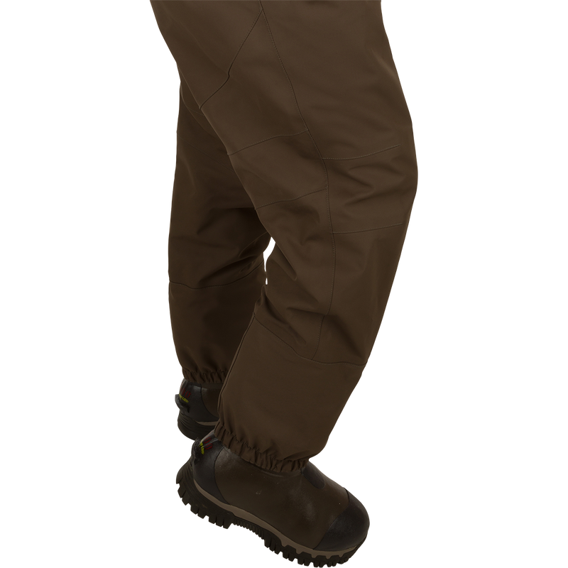 Insulated Guardian Elite HND Front Zip Wader - Brown, featuring durable 4-layer and 5-layer fabrics, reinforced seams, and a Thinsulate® boot lining for warmth and comfort.