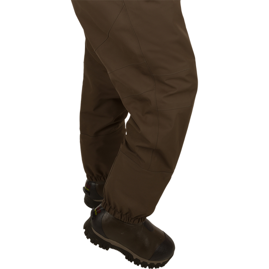 Insulated Guardian Elite HND Front Zip Wader - Brown, featuring durable 4-layer and 5-layer fabrics, reinforced seams, and a Thinsulate® boot lining for warmth and comfort.