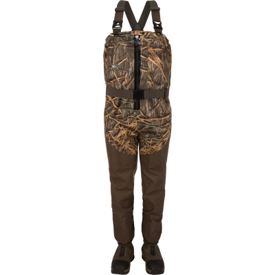 The Insulated Guardian Elite HND Front Zip Wader by Waterfowl in Mossy Oak Original Shadow Grass features adjustable black straps, a front belt, and attached Thinsulate-lined boots—displayed on a plain white background.