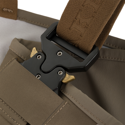 Close-up of a brown strap attached to a black tactical buckle on Drake X Ducks Unlimited BMF1600 Kevlar Wader waterproof waders.