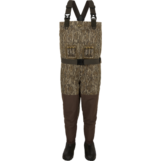 Insulated Guardian Elite Vanguard Breathable Waders - Camouflage waders. Ideal for cold conditions. Waterproof, windproof, and breathable fabric. LokDown insulation for warmth. Store gear in cargo pouch and zippered pocket.