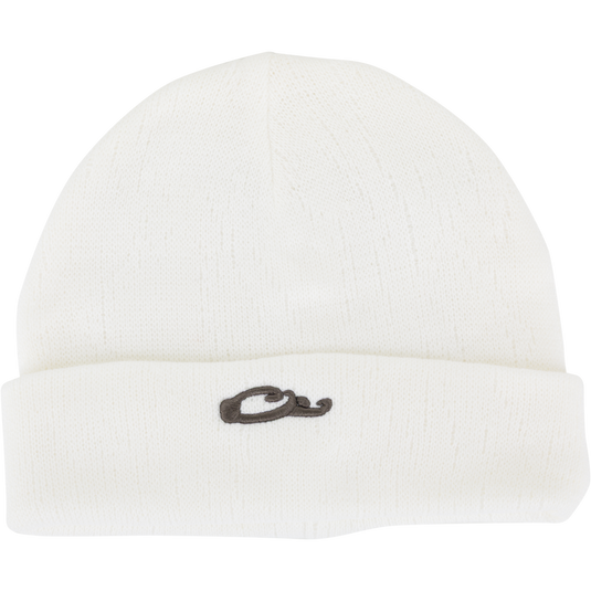 The LST Rib-Knit Stocking Cap by Waterfowl is a white acrylic beanie with a folded brim and a small black Drake duck head logo embroidered on the front in classic roll-up style.