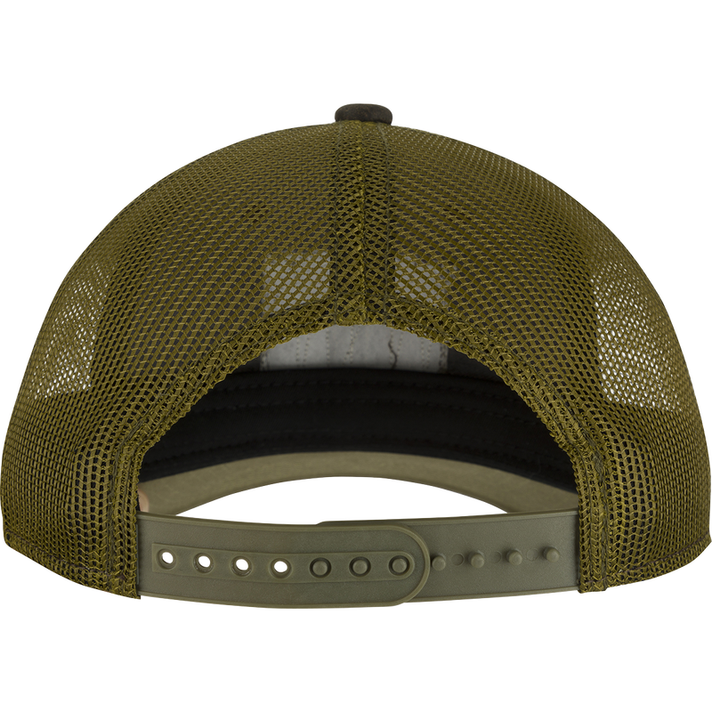 A weathered cotton/poly structured cap with a leather patch featuring the Drake Logo. Trucker-style with a pre-curved visor and adjustable snap back closure.