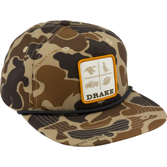 The Drake X Lost Hat DDTF Goat Rope Cap by Lifestyle features an Old School Sport camo look, patch detail with icons above “DRAKE,” a rope accent over the brim, and a structured front panel.
