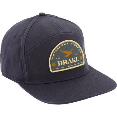 The Drake x Lost Hat Sa7age Waxed Duck Cap by Lifestyle features a dark navy snapback with an orange duck patch and embroidered Waterfowl Systems, Drake, and Est 2002 on the front.