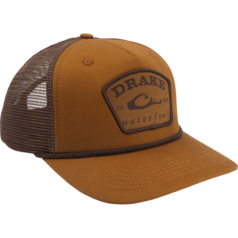 Drake X Lost Hat Rancheero Mesh Back Rope Cap featuring a stitched DRAKE waterfowl EST. 2002 patch, duck graphic, mesh back, and braided rope detail.