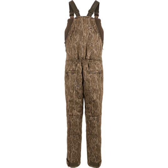 Midweight Nova Silencer Bib with Scent Control, featuring camo pattern, adjustable straps, zippered pockets, and insulated with sherpa fleece for warmth, breathability, and silence.