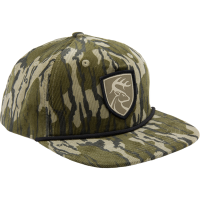 Non-Typical X Lost Hat Cord Goat Rope Hat features a camouflage pattern, deer patch, and paracord rope, crafted from durable corduroy for hunting or casual wear.