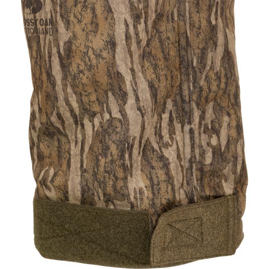 Camouflage Silencer Soft Shell Pant with Agion Active XL scent control, featuring ultra-quiet fabric, adjustable waist, and pockets, designed for mid to late-season hunting.