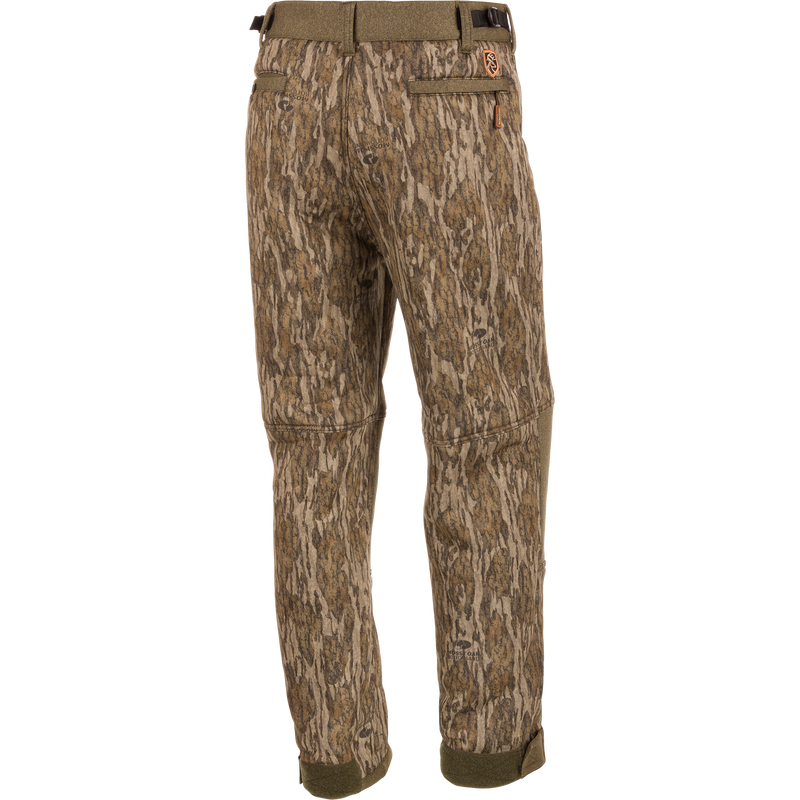 Alt text: Silencer Soft Shell Pant with Agion Active XL featuring camouflage pattern and multiple pockets for hunting.