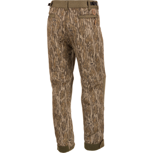 Alt text: Silencer Soft Shell Pant with Agion Active XL featuring camouflage pattern and multiple pockets for hunting.